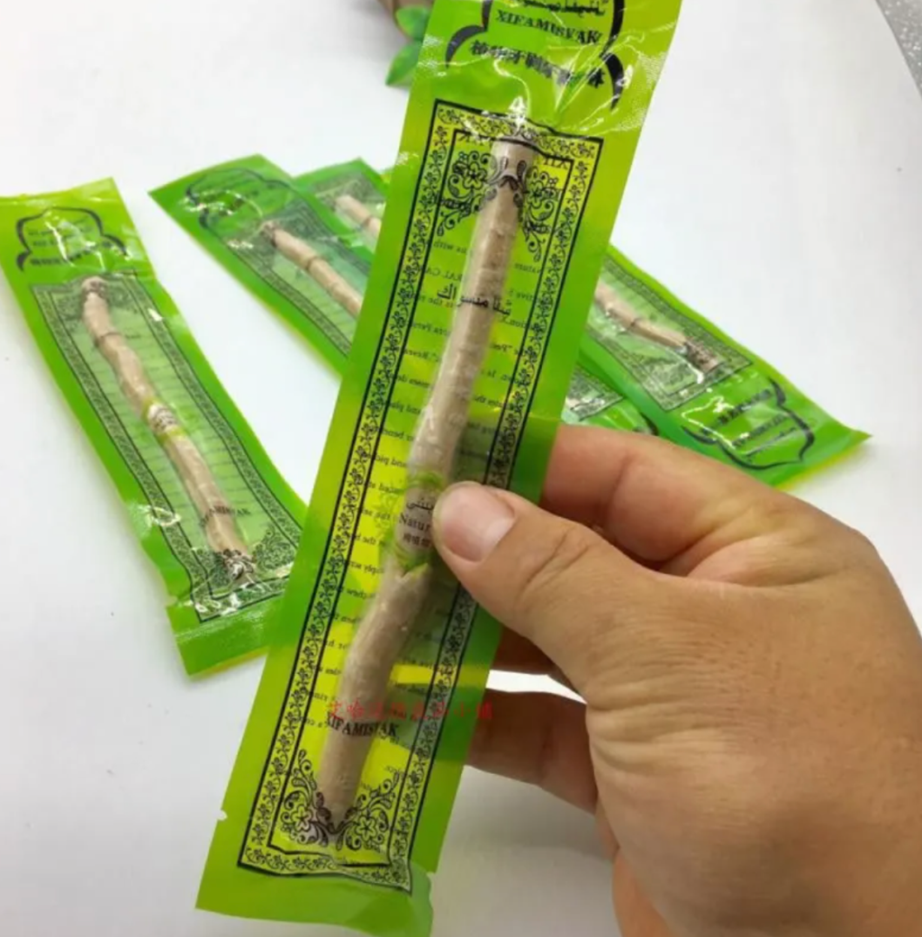 Miswak Tooth Cleaning Stick in a package, perfect for natural oral care and daily teeth cleaning.